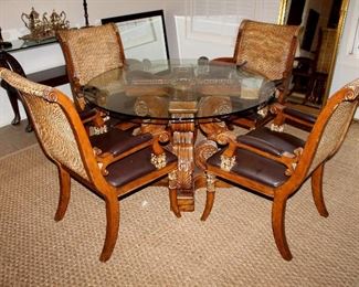 Glass-top table with 4 chairs
