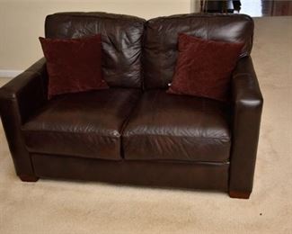 35. Brown Leather Sofa