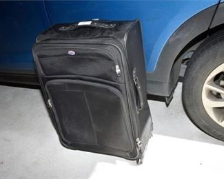 107. Rolling Suitcase