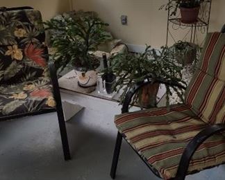 Porch chairs, plants, & fountain