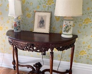Demilune table with beautiful ornate carving
