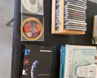 CDS and CD Player...player works but has to be opened manually.