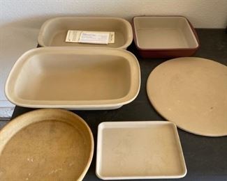 Like new Pampered Chef Baking Stone Ware.  Most of it was never used and came straight out of the box.