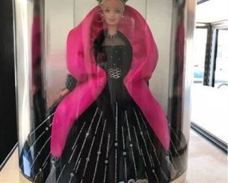 4 Collectible Barbies