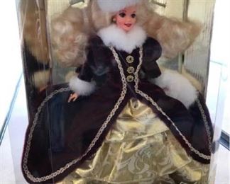 4 Collectible Barbies