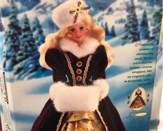4 Collectible Barbies