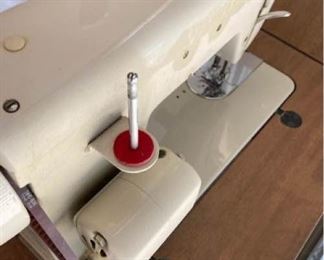 Signature Sewing machine in cabinet