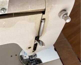 Signature Sewing machine in cabinet