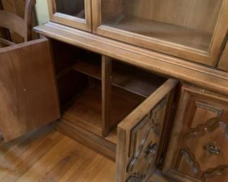 #6	China cabinet with 3 glass doors and 3 wood doors  one piece 47x16x72	 $100.00 

