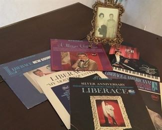 Assorted Liberace LP's, Picture of Liberace and the Lady of the House, and an Autograph Play Program.  Yes, he was a friend of this family.