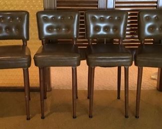 Four brown padded Upholstered Bar Stools