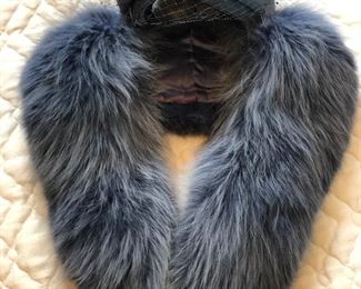 Blue fur wrap with matching blue netted hat. 