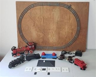 Lionel Train (5 Cars ~ flat car is broken), Oval Track mounted on Wood. Transformer, Station and Western Metal Battery Operated Locomotive (missing front guard and smoke stack)
