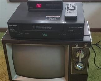 Vintage 13 in. RCA TV, Orion 4 Head VHS player, Kino VHS rewinder,, and Scientific Atlanta Receiver ~ all power on