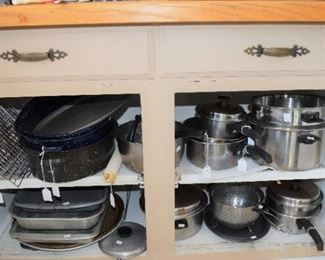 A full set of pans, and two large turkey roasters