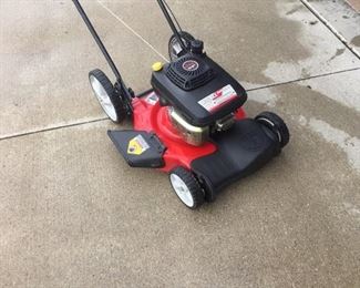 Huskie lawn mower with a Kawasaki motor... 22"  Like New.. 