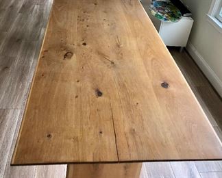 $450 Knotty pine table - 82.75" W, 35" D, 30" H. 