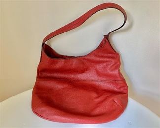 $150  Mario Hernandez red leather purse 