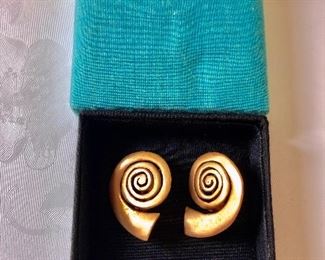 $25 Snail shaped earrings in original box  1 and 1/4 inches long 