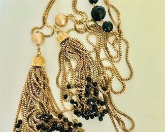 $45 Tassle necklace gold tone with black beads 