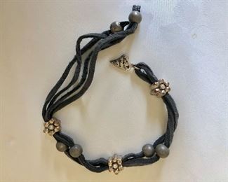 $20 knotted bracelet with beads  8" long 