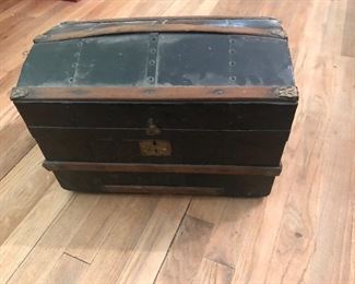 Stunning vintage hump back antique trunk.  Storage, beauty, and history all in one!  