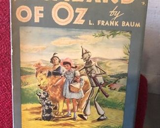 Yep......Dorothy, the Tin Man, Lion, and Scarecrow!  Take a trip over the rainbow!  The original Oz Book!! 