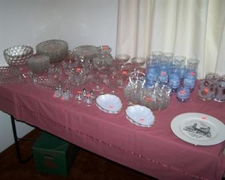 TABLE OF GLASSWARE--FOSTORIA "AMERICA" PATTERN --MANY PIECES STILL WITH PAPER LABELS