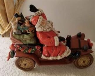 #2  Ceramic Santa Riding Vintage Car With Bag Of Toys $35