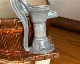 Vtg. Ceramic  watering pump planter - Great planter for when you're on vacation. The gray pump can be filled w/water and it will slowly seep out to keep your plant watered 