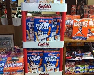 SOME HAVE BEEN SOLD -- Vtg. Canfield's shelving unit  filled with Limited Edition Package of Kellogg's  cereal Sports Edition - never opened 