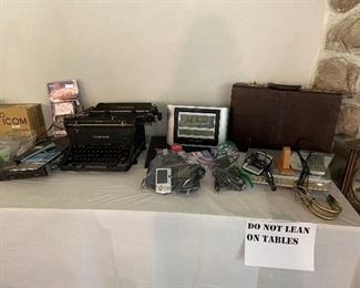 Antique Underwood Typewriter, Digital Camera, DVD Player, Brief Case and Atomic Clock