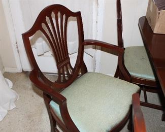 60" double-pedestal mahogany dining table and six chairs