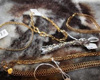 mostly 14 kt, some 10kt and 18kt; some white and rose gold