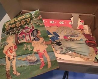 Box of old paper dolls