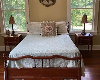 bed, bedding, needlepoint pillow, night stands, lamps, picture