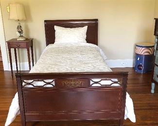 vintage bed, bedding, night table, vintage hat boxes