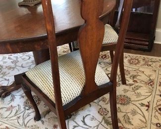 queen anne chairs ,rug, fruit compote