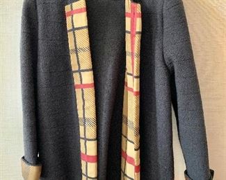 $60 -Lihli at Saks Fifth Avenue black with tan, red and black trim wool and rayon jacket.  Estimated size 1X/XL.