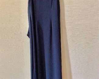 $30 - Nicole Miller triacetate and polyester navy blue sleeveless v neck dress with tieback. Size 8.