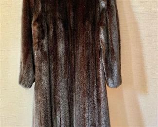 $800 Detail: Back view. Revillon (Saks Fifth Avenue) three quarter length mink coat. Estimated size L.