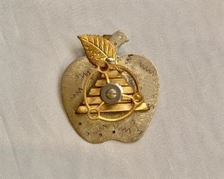 $38 Pendant/pin, signed. 1.5”W x 1.5”H