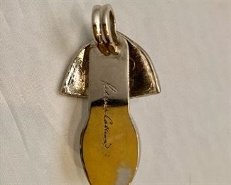 $8 Detail; Back view. Rebecca Collins, signed, pendant. 3”L
