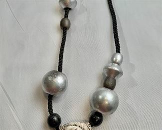 $65 Resin and wood bead necklace. 24"L