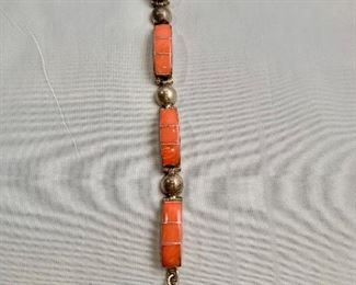 $115 Mexican sterling silver with coral colored stone bracelet. 8"L