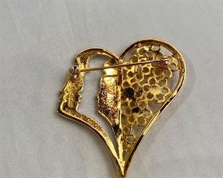 $25 Detail; Back view. Tal Salomon, signed, gold and silver tone and rhinestone heart and face  pendant/brooch. 2"H x 1.5"W