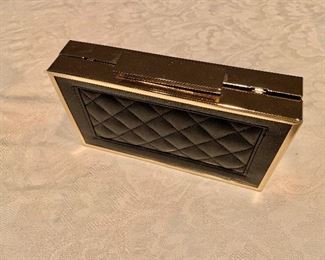 $20 Sasha hard sided black leather quilted evening bag. 7" x 4"