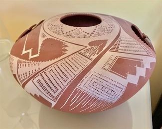$100 Native American style pierced stoneware vessel, signed. 7"H x 11"D