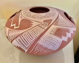 $100 Native American style pierced stoneware vessel, signed. 7"H x 11"D 