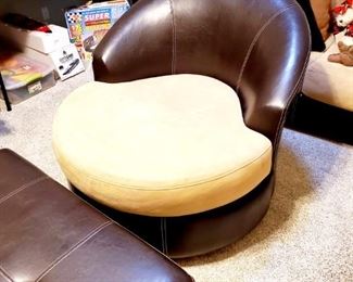 leather and microfiber chair, matches sofa and ottoman . all priced separately.